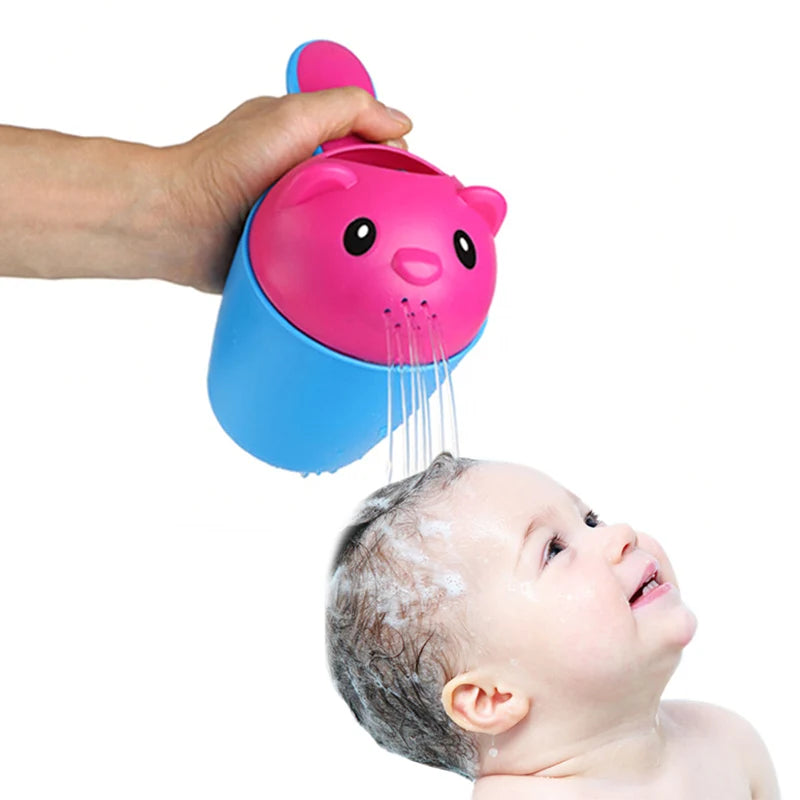 Bear shampoo rinse cup being used to rinse a baby's hair