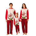 Family wearing matching reindeer Christmas pajamas