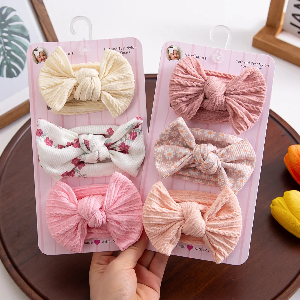 Waffle-knit bow headband 3-packs held in hand