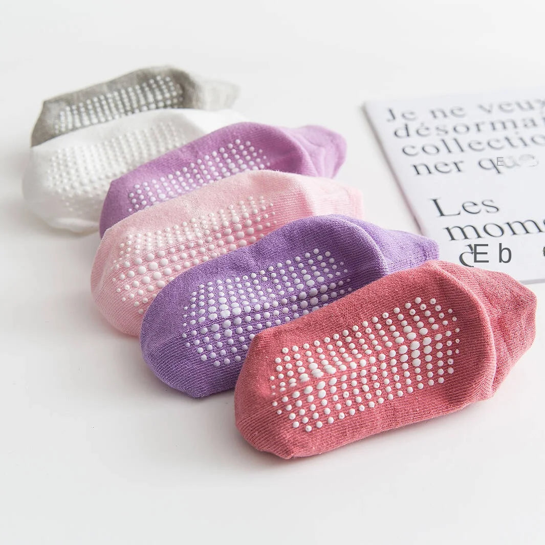 Baby grip socks showing dotted non-slip soles