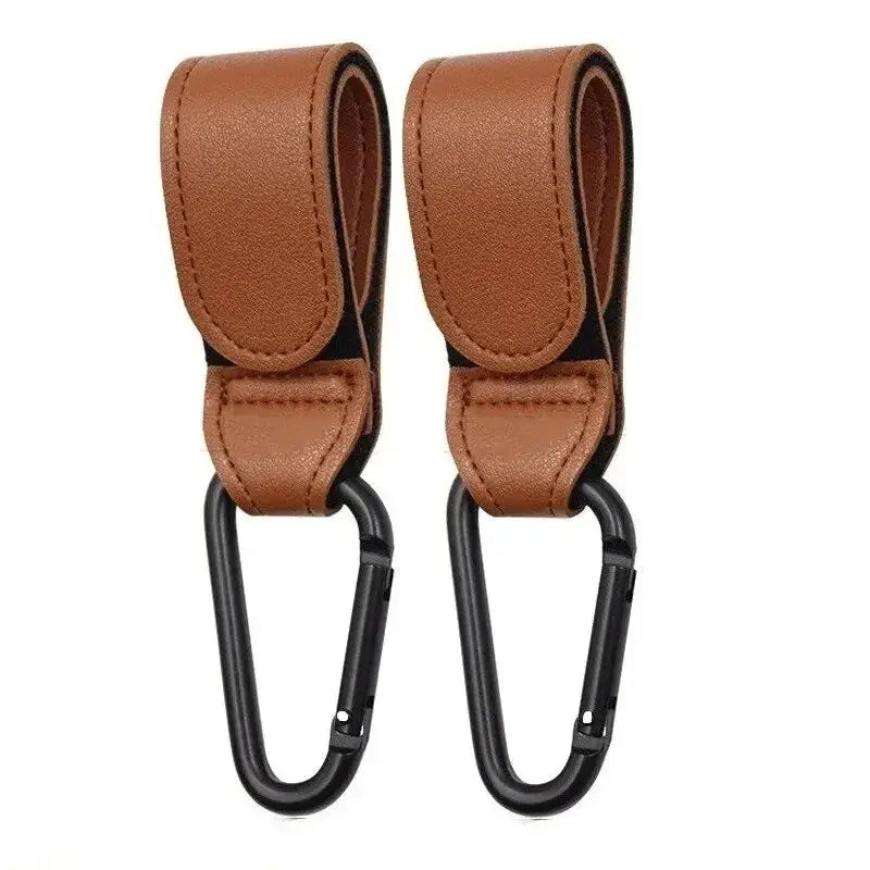 PU leather stroller hooks, close-up of tan straps and carabiners