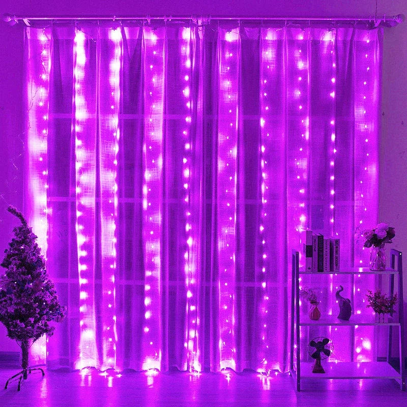 LED curtain string lights glowing on a window