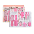 Ten-piece baby healthcare and grooming kit in pink, in its box