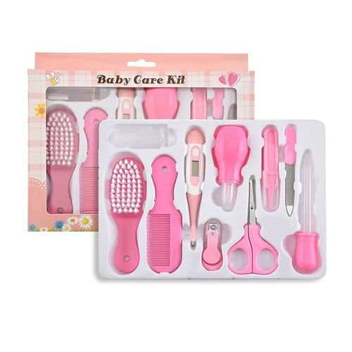 Ten-piece baby healthcare and grooming kit in pink, in its box