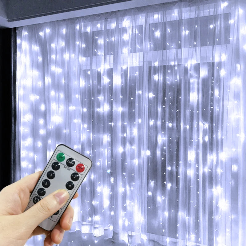 LED curtain string lights in cool white, remote control in hand