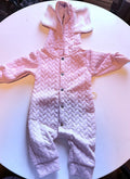 Pale pink quilted baby romper with fluffy bunny-ear hood